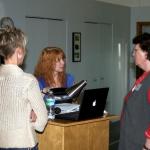 Nicole chats with seminar attendees during a break.