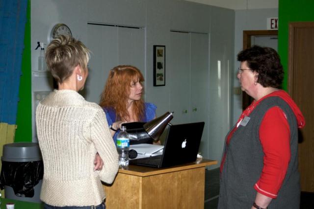 Nicole chats with seminar attendees during a break.